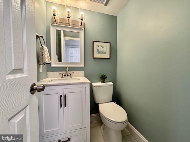 1410 Foxwood Ct, Annapolis, MD 21409 - half bathroom with toilet, vanity, tile patterned floors, and baseboards