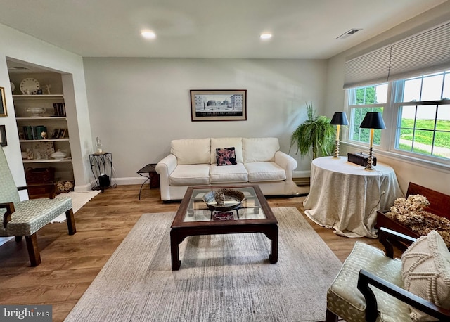 1410 Foxwood Ct, Annapolis, MD 21409 - living room featuring wood finished floors, baseboards, and recessed lighting