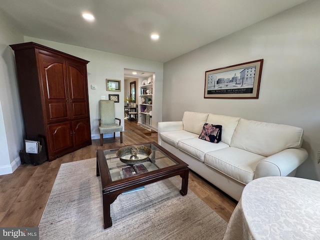 1410 Foxwood Ct, Annapolis, MD 21409 - living area featuring wood finished floors, recessed lighting, and baseboards