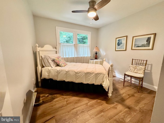 1410 Foxwood Ct, Annapolis, MD 21409 - bedroom featuring hardwood / wood-style floors, baseboards, and a ceiling fan