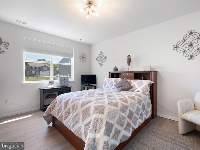 832 Red Maple Rd, Smyrna, DE 19977 - bedroom with baseboards and wood finished floors