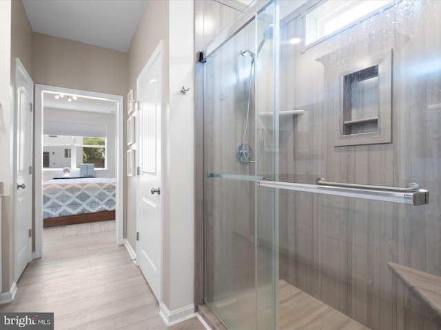 832 Red Maple Rd, Smyrna, DE 19977 - full bath with a stall shower, ensuite bathroom, wood finished floors, and baseboards