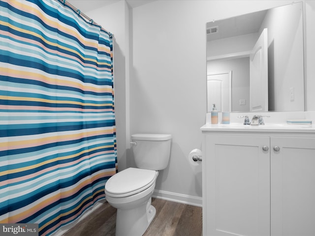 832 Red Maple Rd, Smyrna, DE 19977 - full bath featuring wood finished floors, toilet, baseboards, vanity, and curtained shower