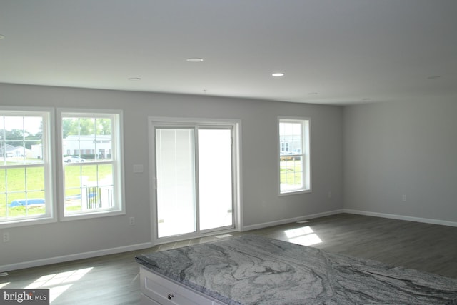 1296 Dorchester Ave, Pocomoke City, MD 21851 - unfurnished bedroom featuring wood finished floors, baseboards, and recessed lighting
