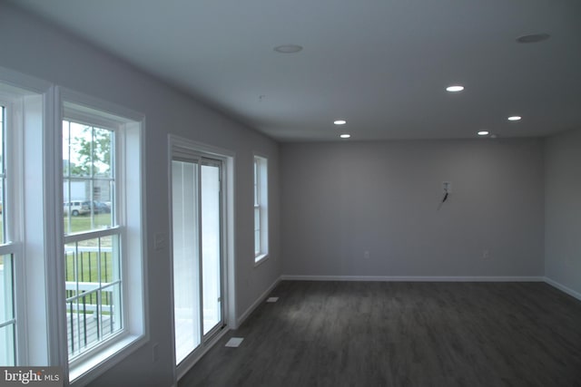 1296 Dorchester Ave, Pocomoke City, MD 21851 - unfurnished room with plenty of natural light, dark wood-type flooring, baseboards, and recessed lighting