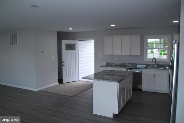 1296 Dorchester Ave, Pocomoke City, MD 21851 - kitchen featuring appliances with stainless steel finishes, a sink, dark wood-style floors, white cabinets, and recessed lighting