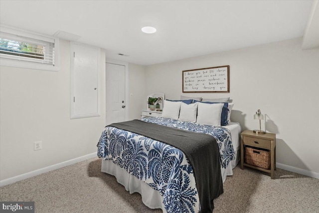 carpeted bedroom with baseboards