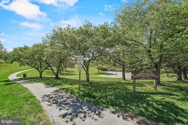 surrounding community with a lawn