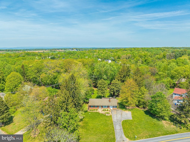 view from above of property featuring a forest