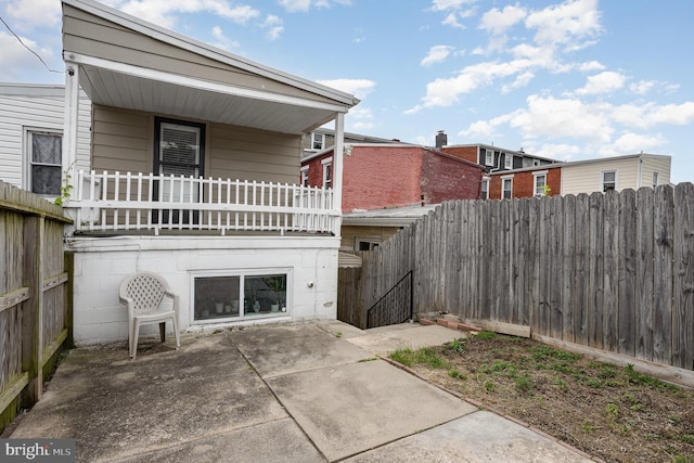 519 N 2nd St, Columbia, PA 17512 - rear view of house with fence and a patio