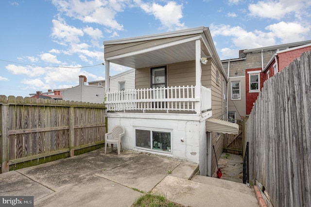 519 N 2nd St, Columbia, PA 17512 - back of house with a fenced backyard, a patio, and a balcony
