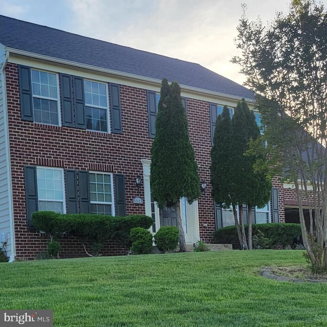 5513 Notched Beak Ct, Waldorf, MD 20601 - view of front facade featuring brick siding and a front yard