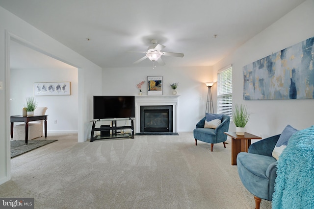 5513 Notched Beak Ct, Waldorf, MD 20601 - carpeted living area with a fireplace with flush hearth and ceiling fan