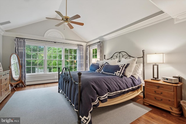 bedroom featuring a baseboard heating unit, wood finished floors, ornamental molding, a ceiling fan, and high vaulted ceiling