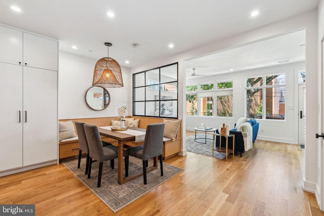 dining space featuring light wood finished floors, recessed lighting, ceiling fan, and baseboards