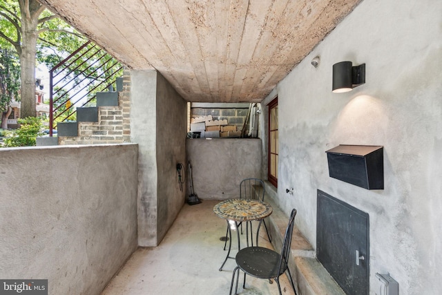view of patio / terrace featuring stairs