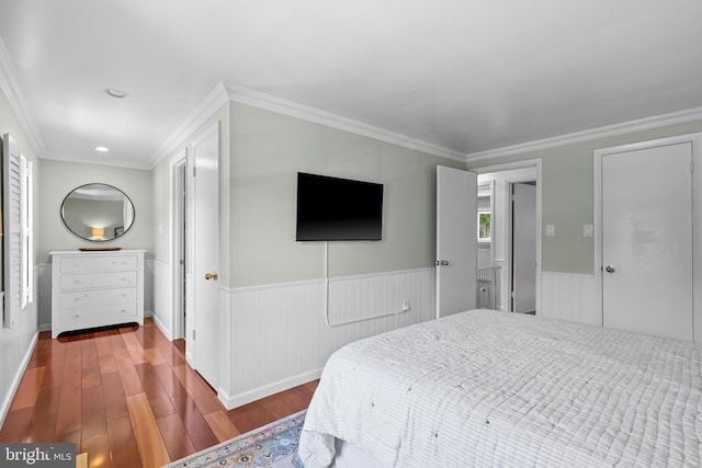 7029 Leewood Forest Dr, Springfield, VA 22151 - bedroom featuring wood finished floors, a wainscoted wall, crown molding, and recessed lighting