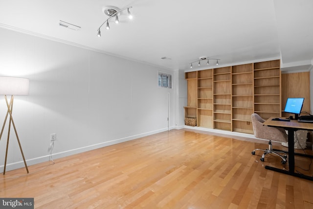 7029 Leewood Forest Dr, Springfield, VA 22151 - unfurnished office with rail lighting, ornamental molding, light wood-style flooring, and baseboards