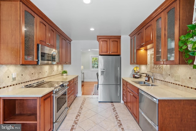 7029 Leewood Forest Dr, Springfield, VA 22151 - kitchen featuring stainless steel appliances, a sink, open shelves, backsplash, and recessed lighting