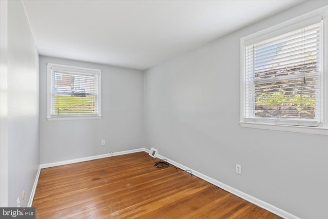 6920 Lawnton St, Philadelphia, PA 19128 - empty room with baseboards and wood finished floors