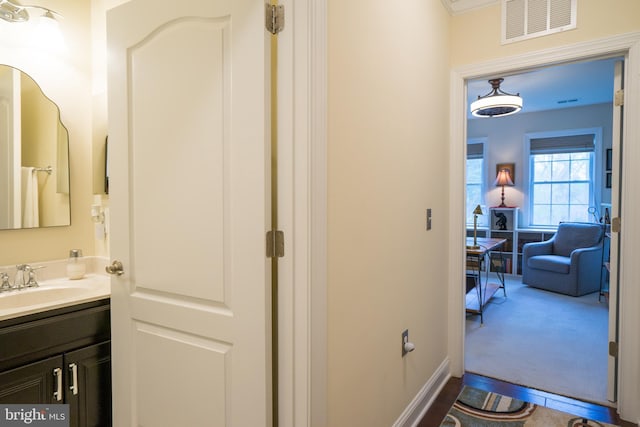 hallway with a sink