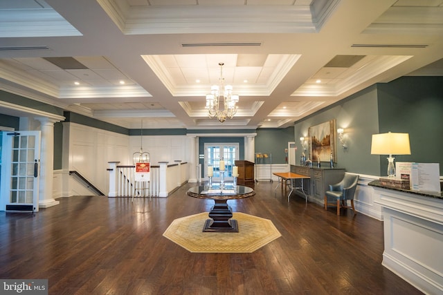 community lobby with crown molding, a decorative wall, coffered ceiling, and beam ceiling