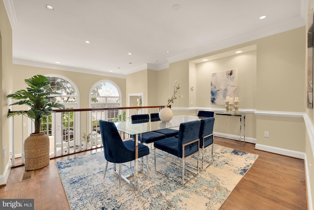 2221 N Oak Ct, Arlington, VA 22209 - dining room featuring wood finished floors, recessed lighting, ornamental molding, and baseboards