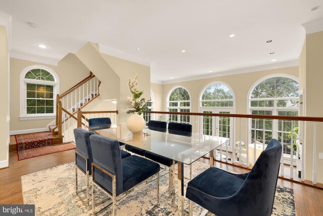 2221 N Oak Ct, Arlington, VA 22209 - living area featuring stairway, crown molding, wood finished floors, recessed lighting, and baseboards