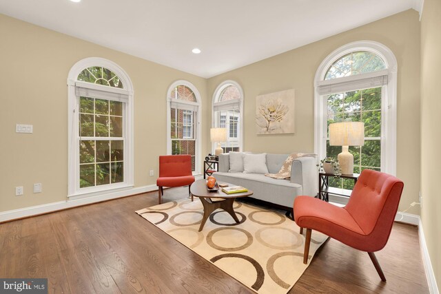 2221 N Oak Ct, Arlington, VA 22209 - sitting room featuring baseboards, wood finished floors, and recessed lighting
