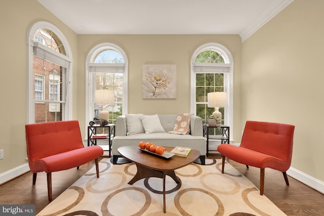 2221 N Oak Ct, Arlington, VA 22209 - sitting room featuring plenty of natural light, wood finished floors, baseboards, and crown molding