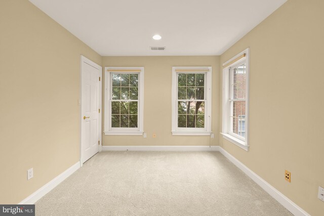 2221 N Oak Ct, Arlington, VA 22209 - unfurnished room with baseboards, carpet, plenty of natural light, and recessed lighting