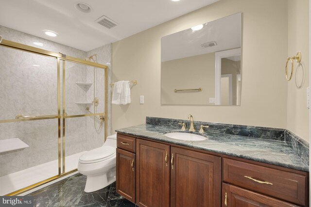 2221 N Oak Ct, Arlington, VA 22209 - bathroom with marble look tile flooring, vanity, toilet, a stall shower, and recessed lighting