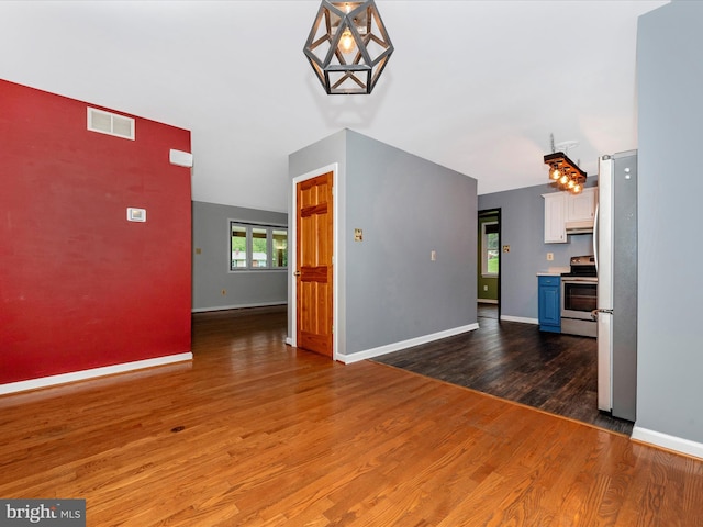 4106 Teklen Dr, Westminster, MD 21157 - unfurnished living room with wood finished floors and baseboards