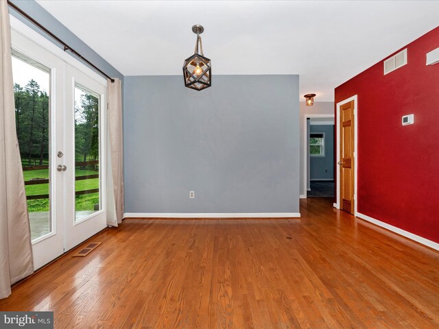 4106 Teklen Dr, Westminster, MD 21157 - spare room featuring wood finished floors and baseboards