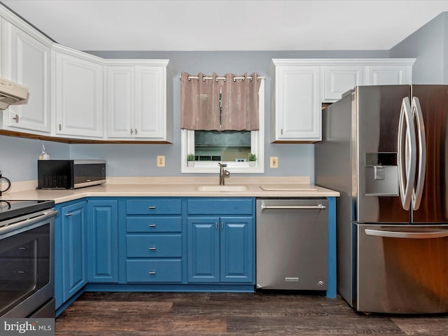 4106 Teklen Dr, Westminster, MD 21157 - kitchen with appliances with stainless steel finishes, blue cabinets, a sink, and white cabinetry