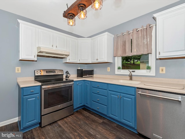 4106 Teklen Dr, Westminster, MD 21157 - kitchen featuring appliances with stainless steel finishes, under cabinet range hood, blue cabinetry, a sink, and dark wood finished floors
