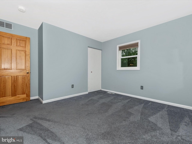 4106 Teklen Dr, Westminster, MD 21157 - unfurnished room featuring a smoke detector, dark colored carpet, and baseboards