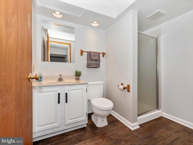4106 Teklen Dr, Westminster, MD 21157 - bathroom with wood finished floors, a shower stall, vanity, toilet, and baseboards
