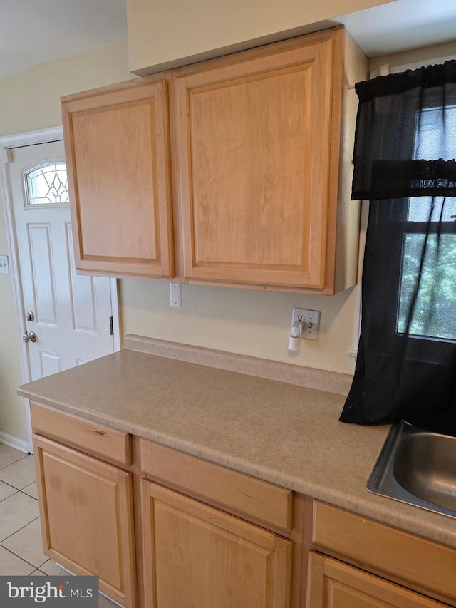 13103 Chalfont Ave, Fort Washington, MD 20744 - kitchen featuring light brown cabinets, light tile patterned floors, and light countertops