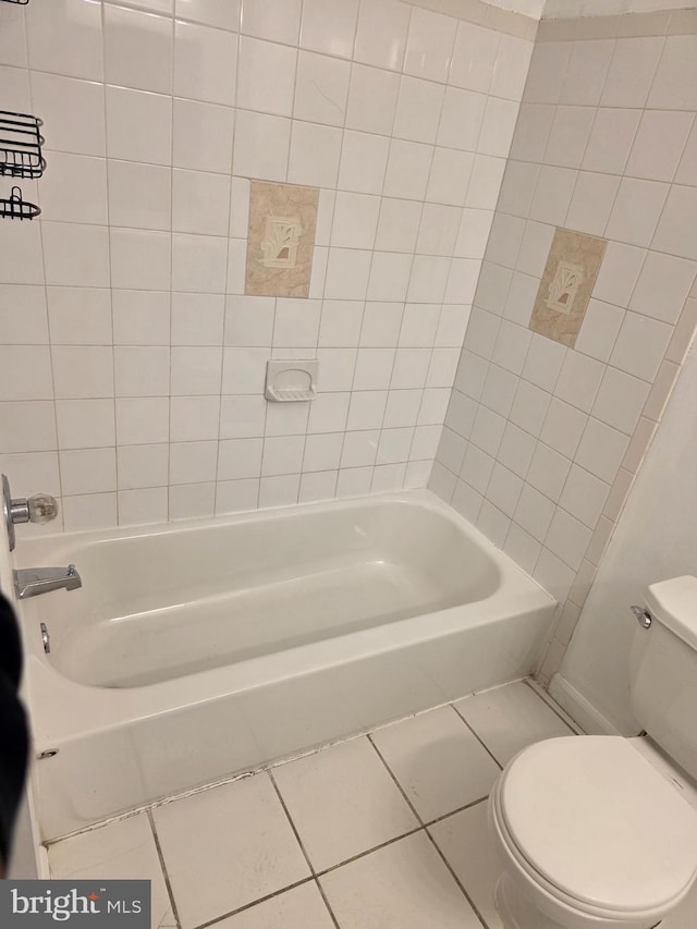 13103 Chalfont Ave, Fort Washington, MD 20744 - bathroom with tile patterned floors, toilet, and bathtub / shower combination