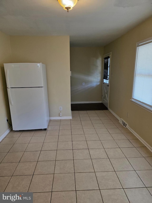 13103 Chalfont Ave, Fort Washington, MD 20744 - empty room featuring light tile patterned floors and baseboards