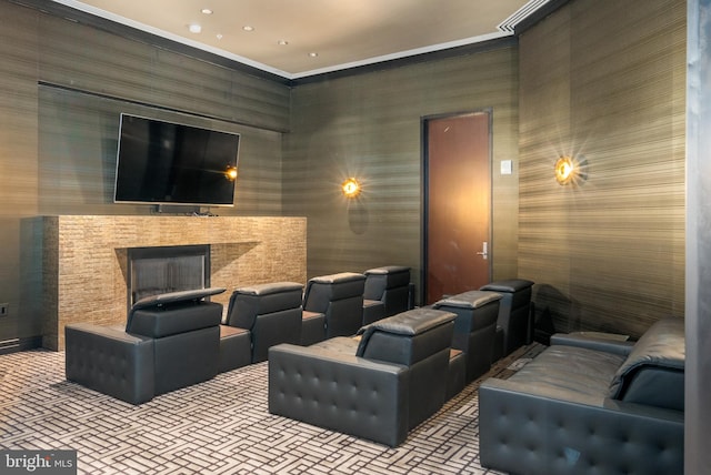 1414 S Penn Sq Unit 18H, Philadelphia, PA 19102 - cinema featuring wallpapered walls, a fireplace, ornamental molding, and recessed lighting