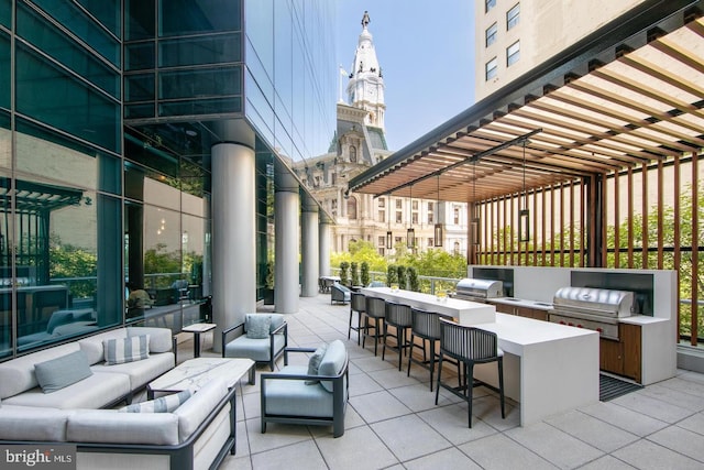 1414 S Penn Sq Unit 18H, Philadelphia, PA 19102 - view of patio / terrace with an outdoor kitchen, an outdoor hangout area, and grilling area