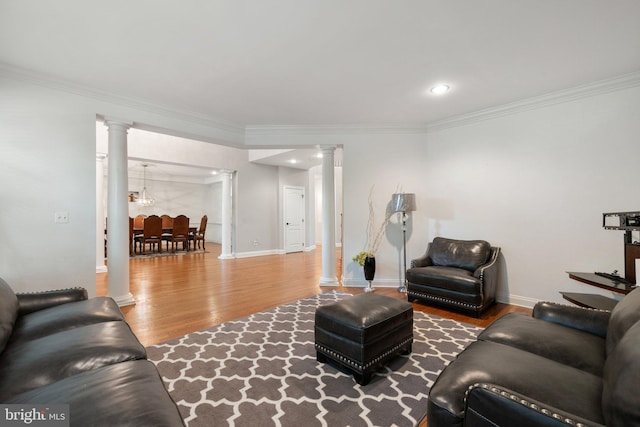 18309 Eldorado Way, Leesburg, VA 20176 - living area with ornate columns, wood finished floors, ornamental molding, recessed lighting, and baseboards