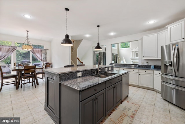 18309 Eldorado Way, Leesburg, VA 20176 - kitchen with stainless steel appliances, a sink, plenty of natural light, white cabinetry, and recessed lighting