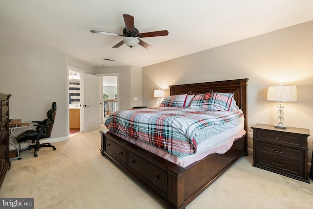 18309 Eldorado Way, Leesburg, VA 20176 - bedroom with light colored carpet, a ceiling fan, baseboards, a desk, and connected bathroom