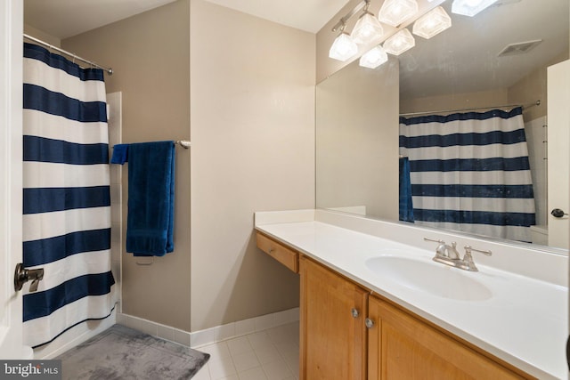 18309 Eldorado Way, Leesburg, VA 20176 - bathroom with vanity, tile patterned floors, baseboards, and curtained shower
