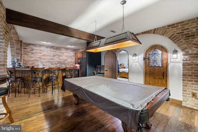 18309 Eldorado Way, Leesburg, VA 20176 - playroom featuring brick wall, a dry bar, wood-type flooring, billiards table, and arched walkways
