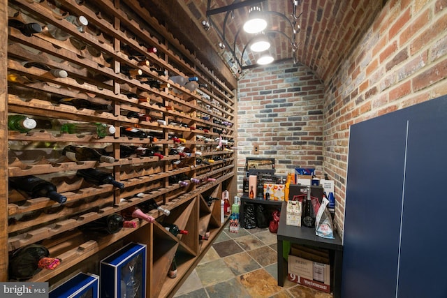 18309 Eldorado Way, Leesburg, VA 20176 - wine area with brick wall, brick ceiling, vaulted ceiling, and stone finish floors