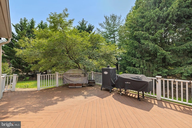 18309 Eldorado Way, Leesburg, VA 20176 - wooden terrace with view of scattered trees and grilling area